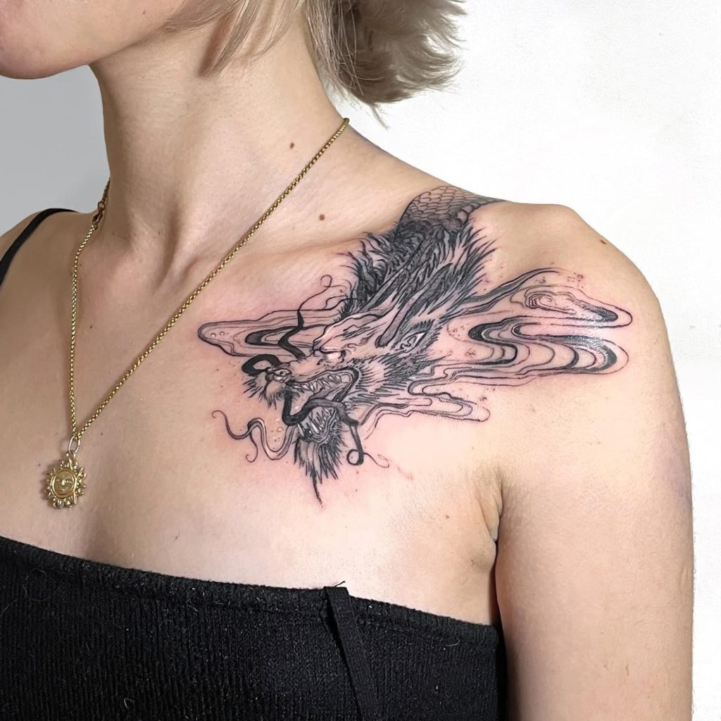 Dragon tattoo on shoulder